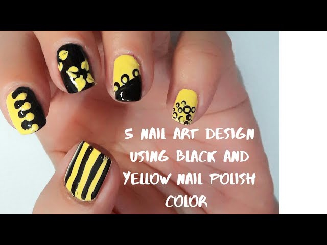 Nail Art Design Using Black And Yellow Nail Polish Color