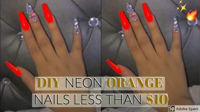 Orange Neon Nails With Diamonds