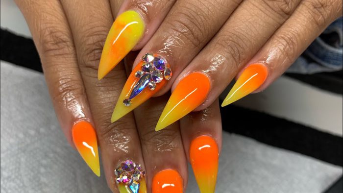 Neon Yellow And Orange Stiletto Nails